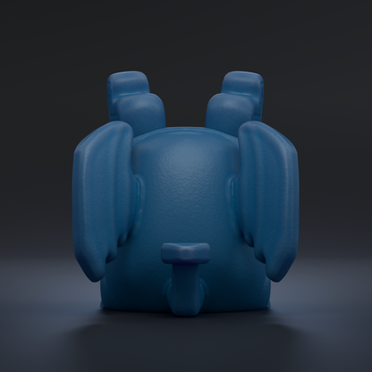 A blue, three-dimensional toy or figurine is shown against a dark background.