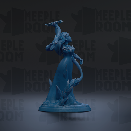 A blue figurine of a woman with a long, flowing dress and a crown on her head, standing on a pedestal and holding a staff.