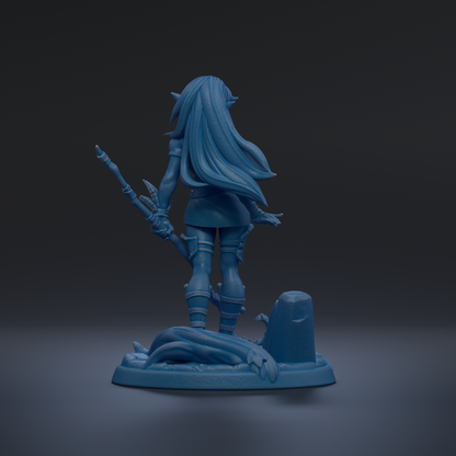 A blue 3D model of a female character with long hair, holding a weapon, standing on a base with a rock and a dragon.