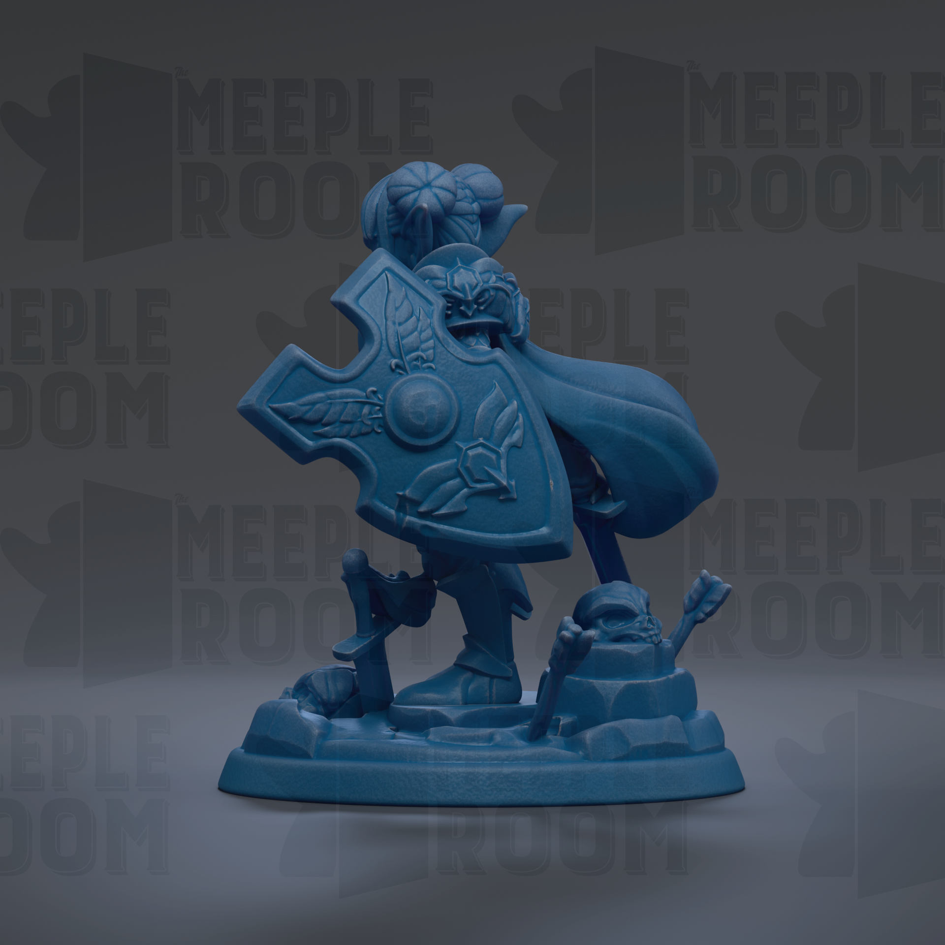 A blue figurine of a person holding a shield and standing on a rock formation.