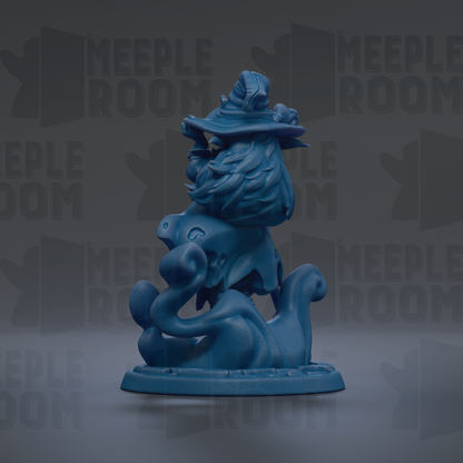 A blue, whimsical figurine of a creature with a pointed hat and long hair, sitting on a base.