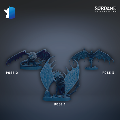 three blue dragon figurines, each in a different pose, arranged against a dark background.