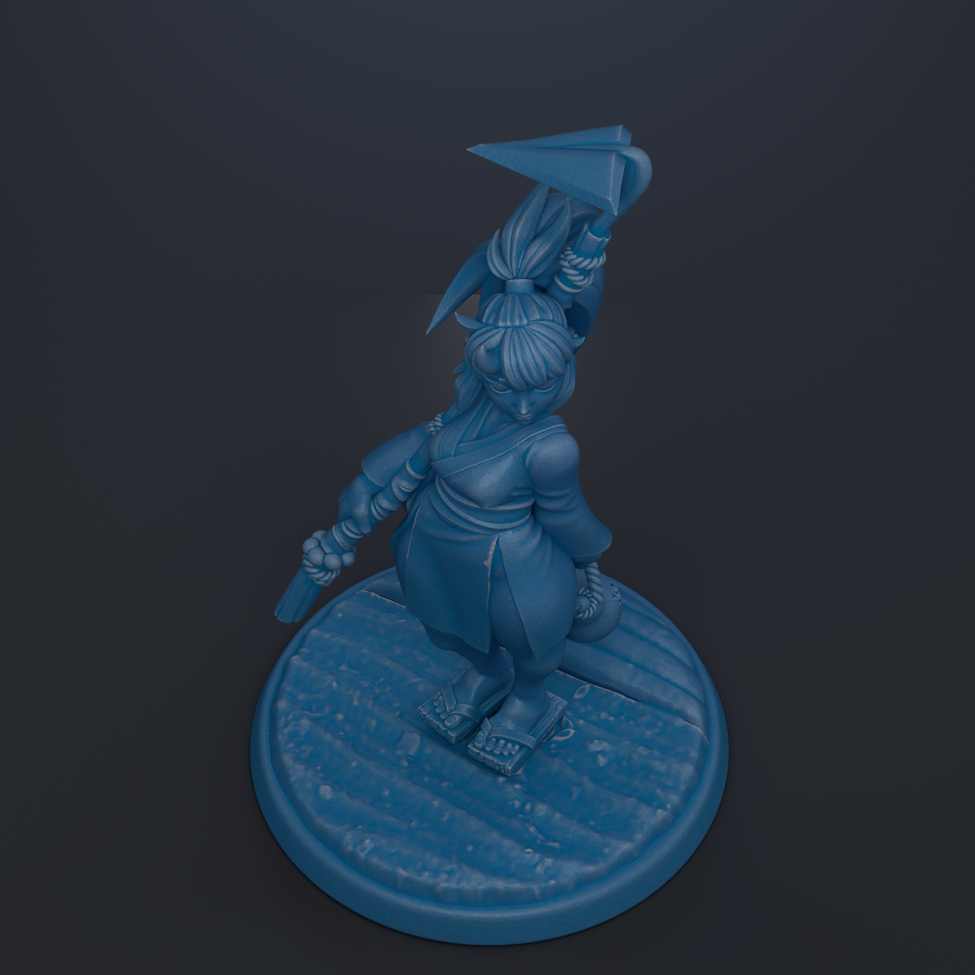 A blue figurine of a person standing on a circular base, holding a weapon in their hand.