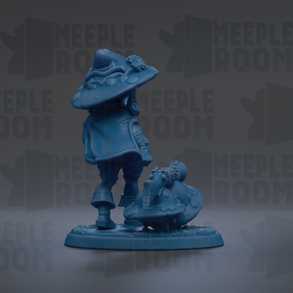 A blue figurine of a person wearing a hat with a flower on it, standing on a base.