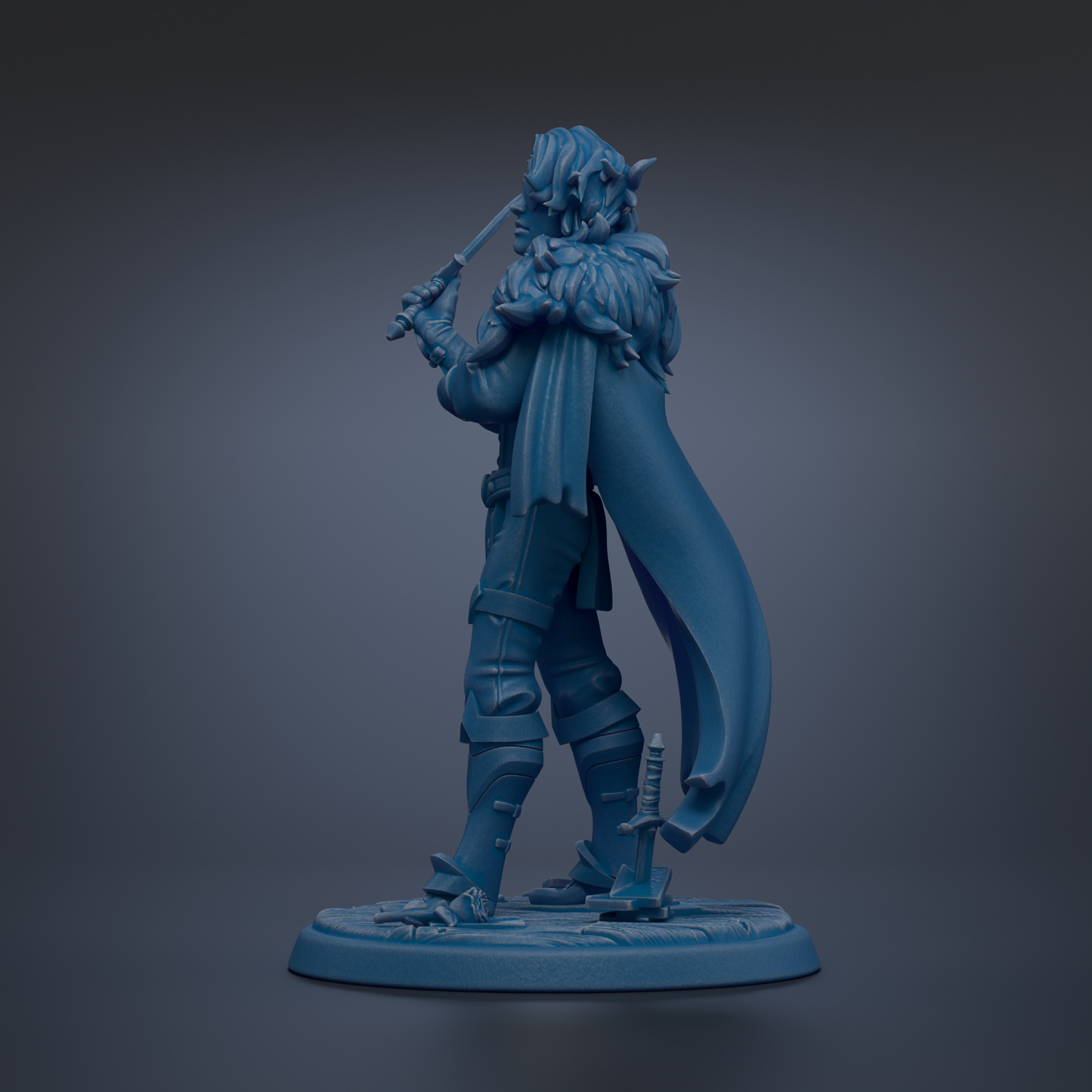 A blue figurine of a person holding a sword and wearing a cape, standing on a base.