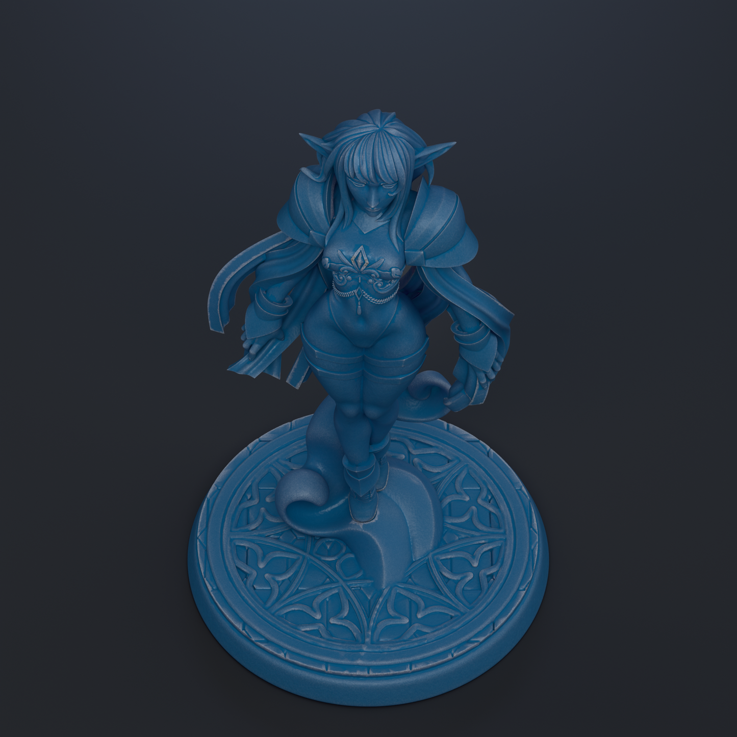 A blue figurine of a female character with long hair and a flowing robe, standing on a circular base with an intricate design.