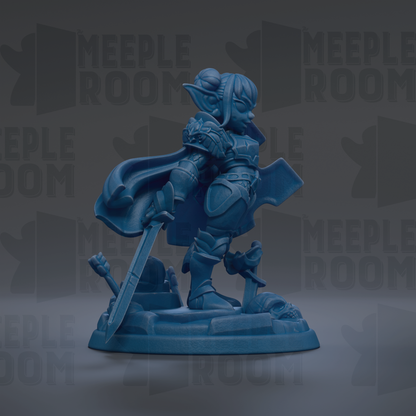 A blue figurine of a warrior-like character holding a sword and shield, standing on a base with a skull and crossbones symbol.