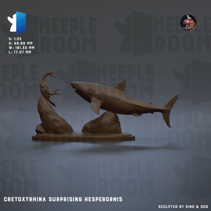 a shark sculpture with a fish sculpture on top of rocks, and the shark is shown in a dynamic pose.