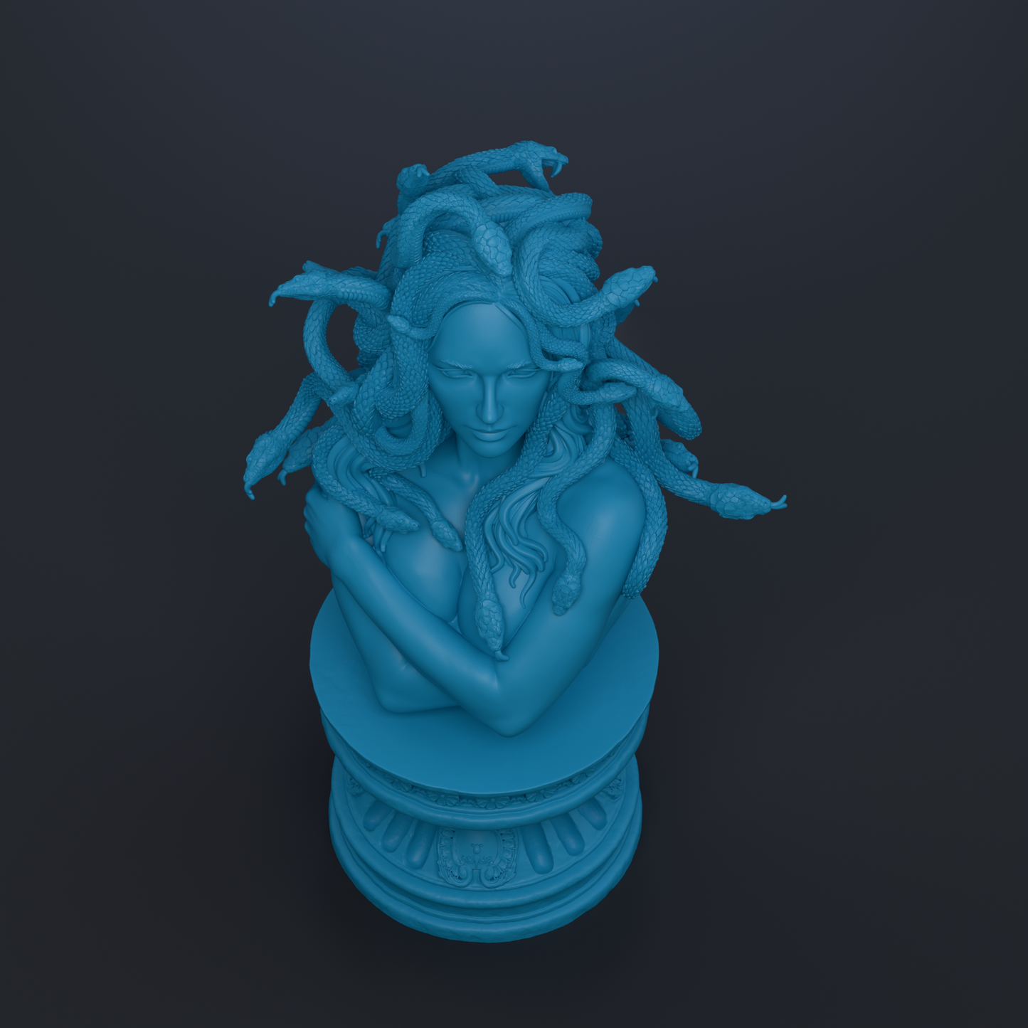 A blue bust sculpture of a woman with snakes wrapped around her head and neck.