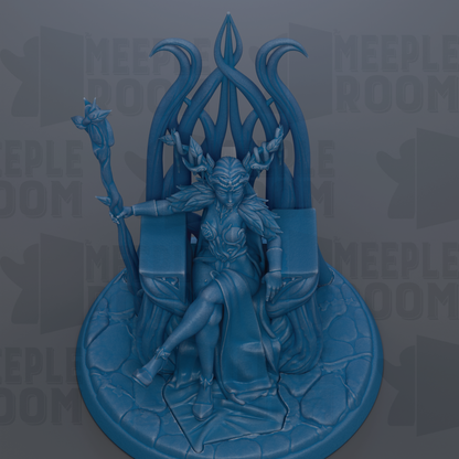 A blue statue of a female figure sitting on a throne-like structure, holding a staff and surrounded by intricate, organic-looking designs.