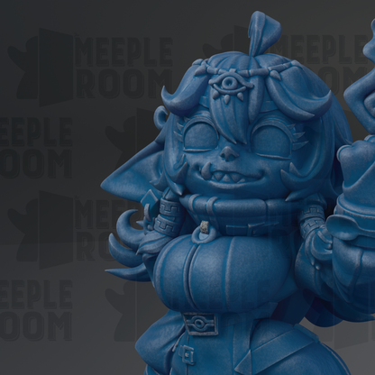 A close-up of a blue, cartoonish statue of a character with a large head, wearing a crown and holding a weapon.
