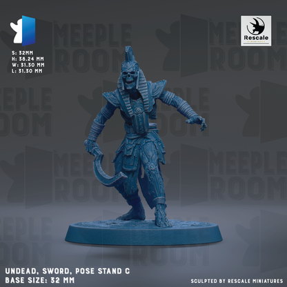 a figurine of an ancient Egyptian warrior, specifically a pharaoh, posed on a base. The figurine is depicted in a dynamic pose, with a sword in hand, and is set against a dark background. The base size of the figurine is 32mm.