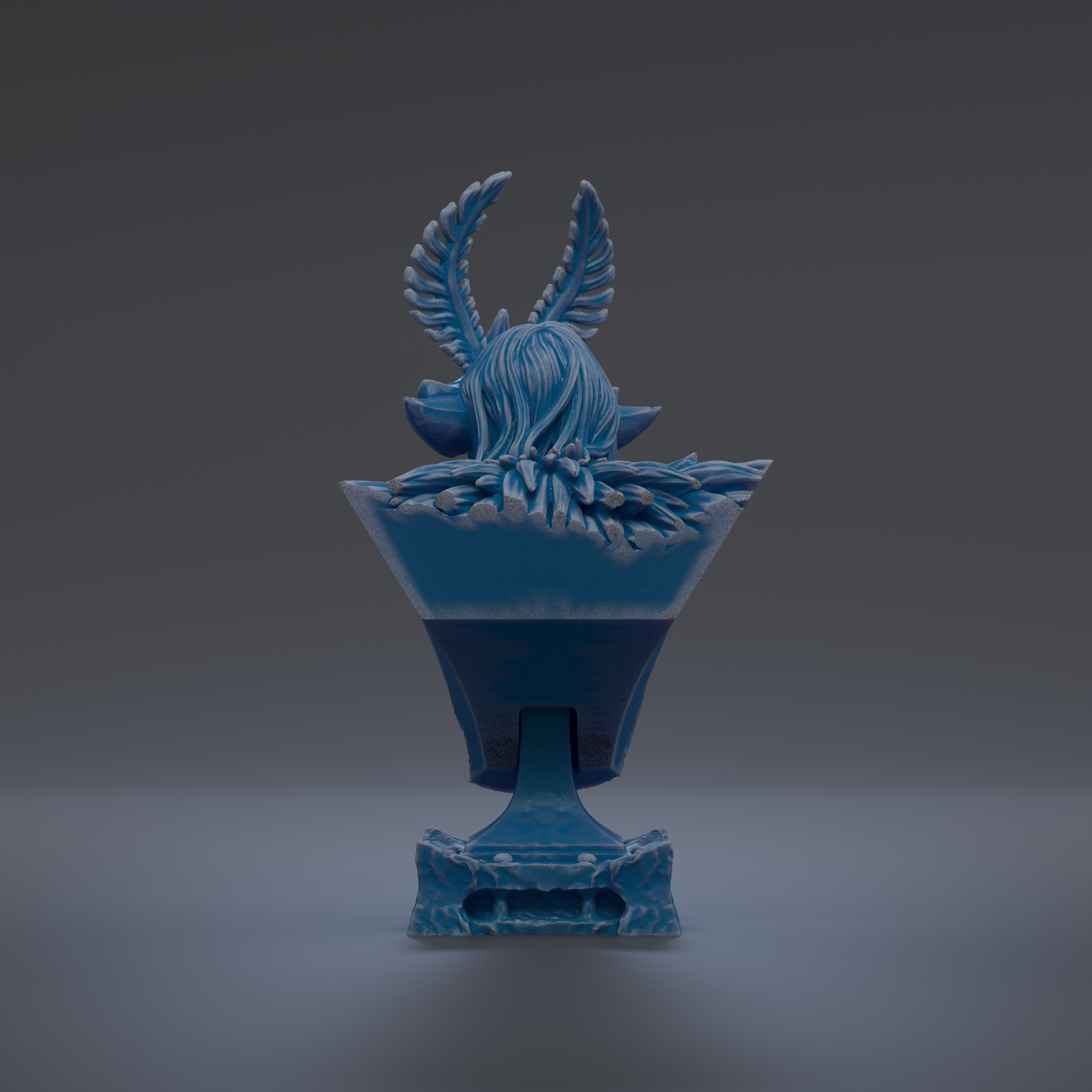 A blue ceramic sculpture with a stylized bird-like figure on top, set against a dark background.