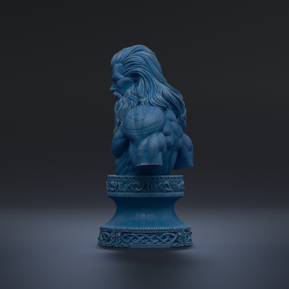 A blue statue of a muscular man with long hair, standing on a decorative base.