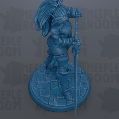 A blue figurine of a warrior standing on a stone base, holding a sword and shield.