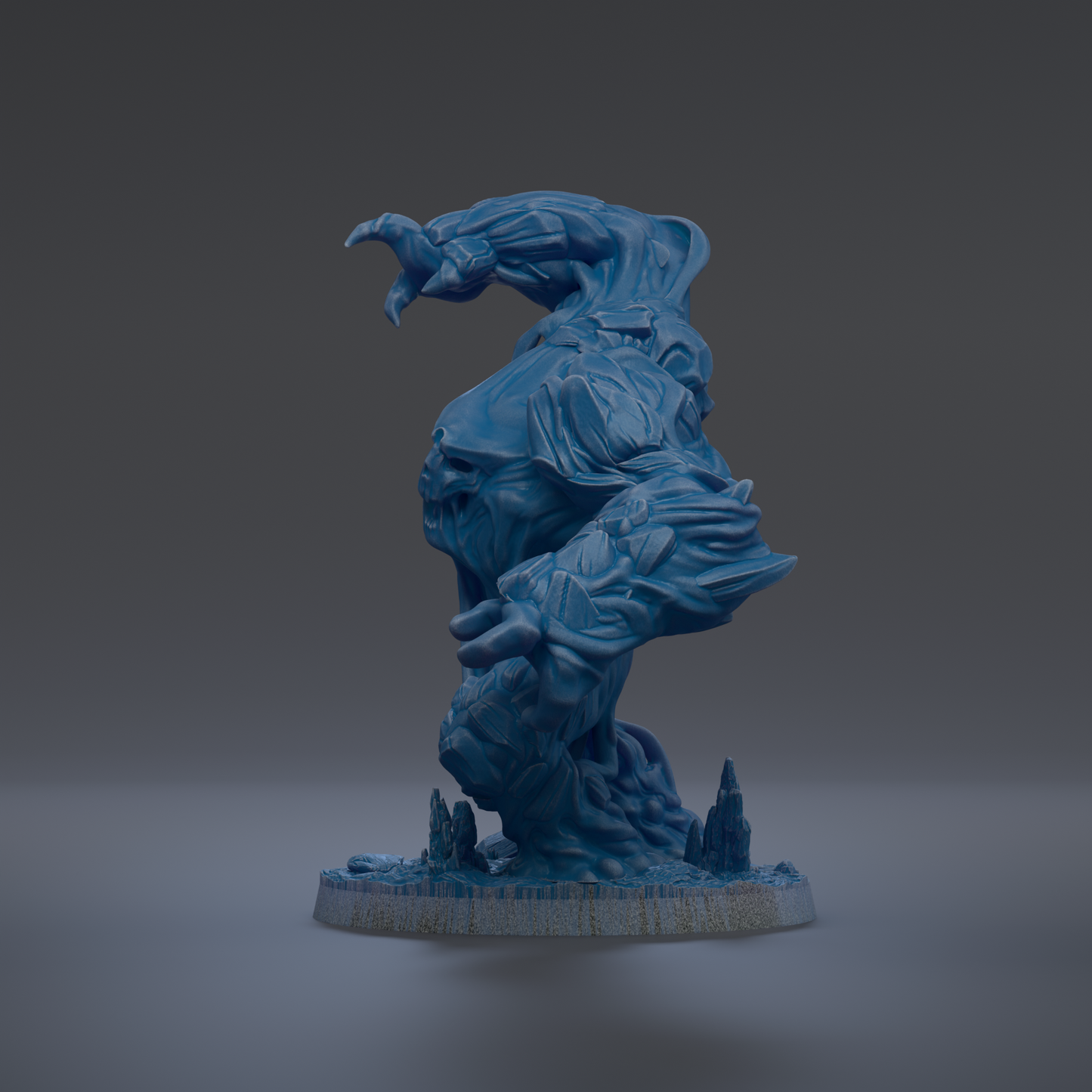 A blue, sculpted figurine of a fantastical creature with a large head and long, flowing body stands on a base with small rocks and plants.