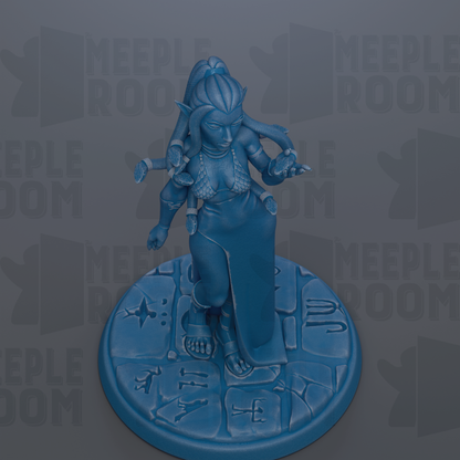 A blue figurine of a woman with multiple arms and a long, flowing skirt, standing on a circular base with various symbols and designs.