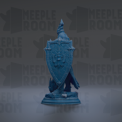 A blue shield-like object with a design on it, standing on a base.