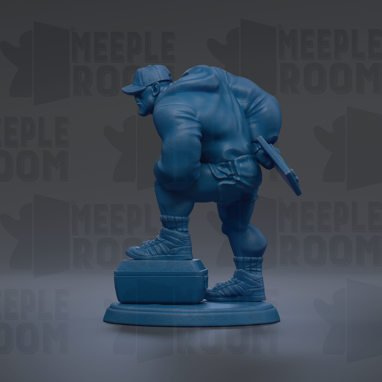 A blue statue of a person holding a gun and standing on a suitcase.