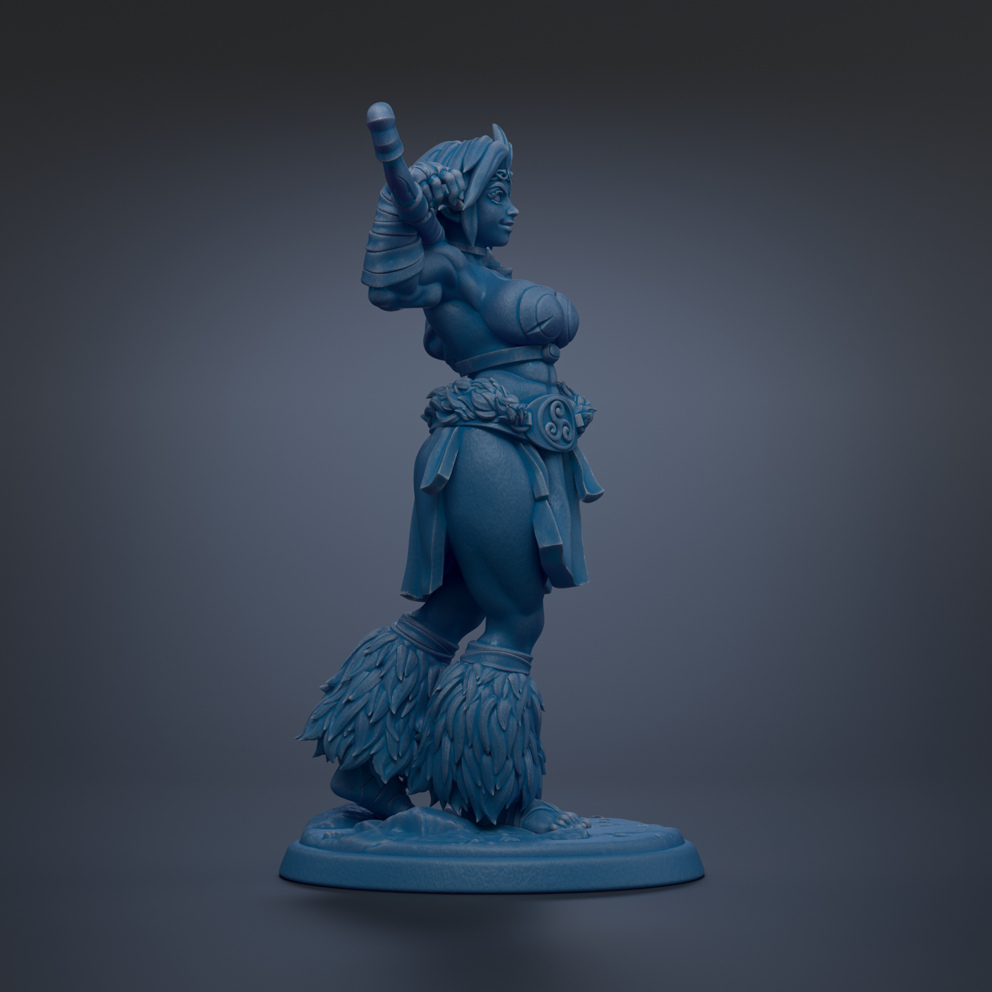 A blue figurine of a woman with a raised fist, standing on a base with large feathered legs.