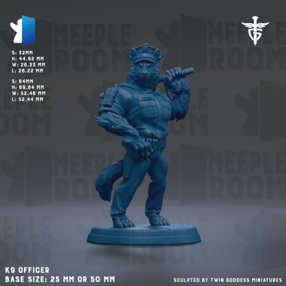 A blue figurine of a police officer holding a baton, standing on a base.