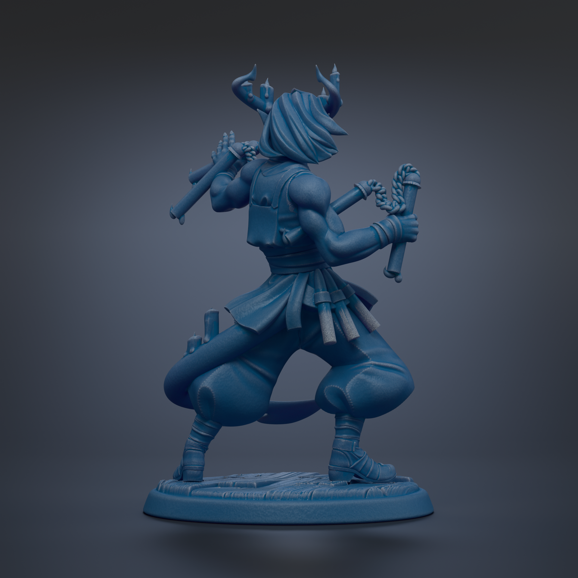 A blue statue of a person with horns and a flowing robe, holding a weapon and standing on a platform.