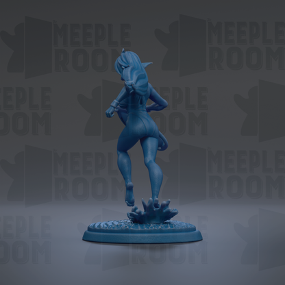 A blue figurine of a female character with long hair and a flowing skirt, standing on a base and appearing to be in motion.