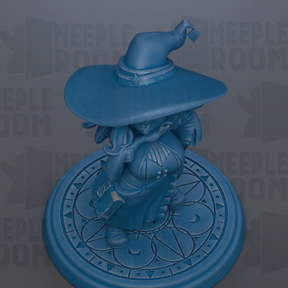 A blue statue of a wizard or magical figure wearing a pointed hat and holding a book, standing on a circular base with a geometric pattern.