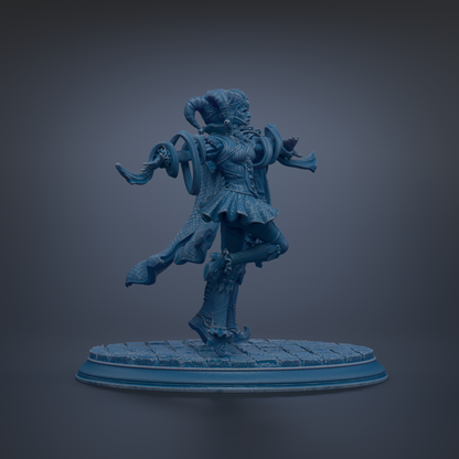 A blue statue of a figure with horns and a flowing skirt, standing on a pedestal.