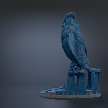 A blue owl statue perched on a pedestal against a dark background.
