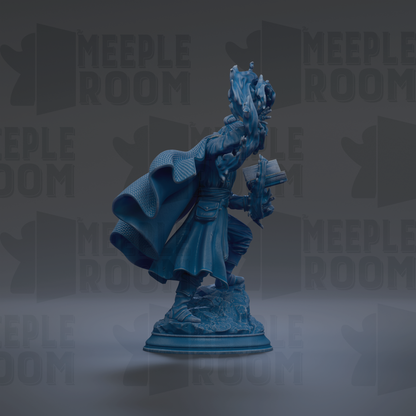 A blue statue of a person holding a book and standing on a rock.