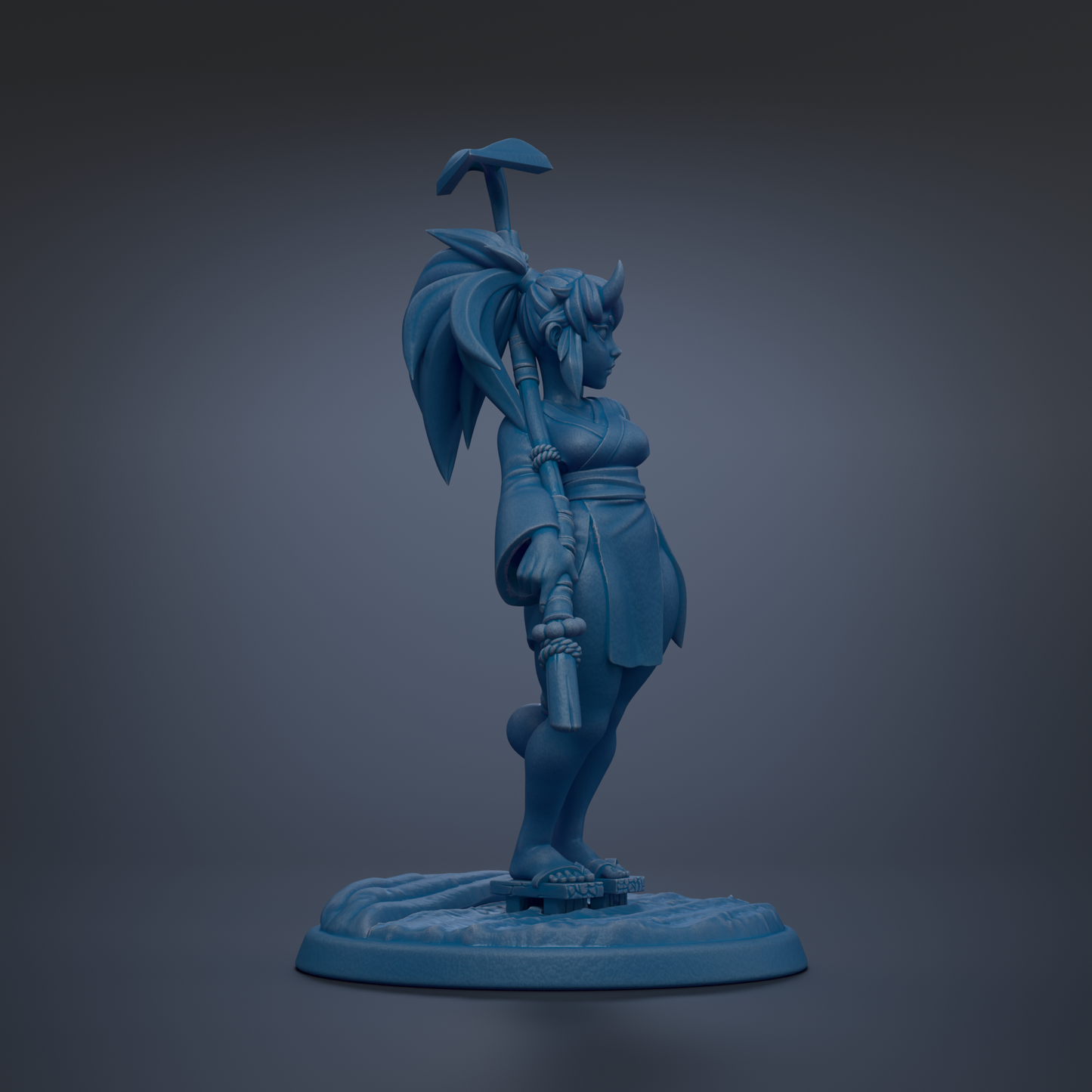 A blue statue of a woman with a large headdress and holding a spear.