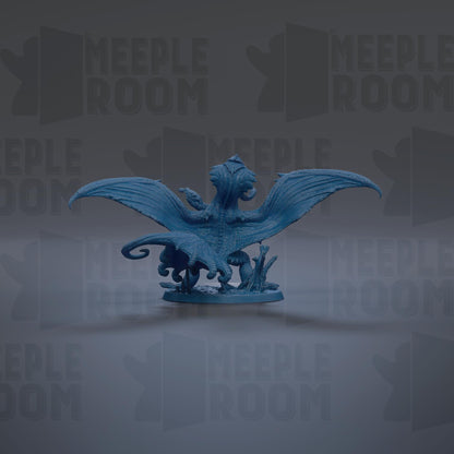 A blue dragon figurine with wings spread, standing on a base with mushrooms and plants.